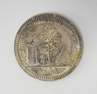 une pièce de monnaie en argent portant l'image d'un homme et d'une femme