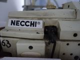 a sewing machine that is sitting on top of a table