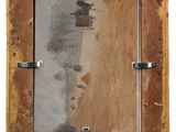 an old wooden picture frame with a mirror hanging on a wall