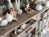 a table with a lot of vases and other items on it