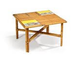 a small wooden table with a magazine on top of it