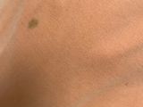 a close up of a person ' s arm with a tattoo on it