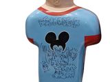 mickey mouse figurine with a blue shirt with a mickey mouse on it