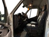 a white truck with black leather seats and a steering wheel