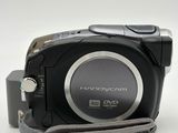 a camera that is sitting on a white surface