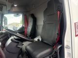 a view of the inside of a van from the driver ' s seat