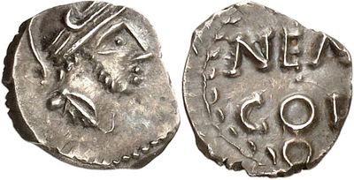 a silver coin with an image of a man on it