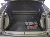 a trunk of a car with a tool box in it