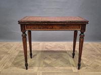 Table à jeux en bois plaqué et bois noirci, le plateau dépli…