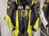 two leather motorcycle jackets are lined up on a white background