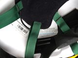 a close up of a helmet with a tag on it
