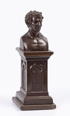 Sculpture en bronze à patine brun nuancé représentant un bus…