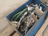 a blue box filled with assorted hoses on a pallet