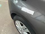 a sticker on the side of a car that has a sticker on it