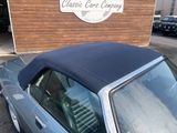 a car that is parked in front of a building