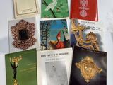 a lot of books that are sitting on a table