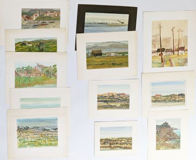 a lot of paintings hanging on the wall of a room