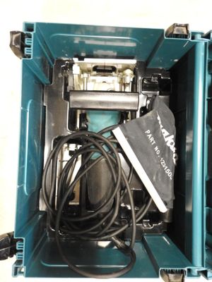 a blue box with a machine inside of it