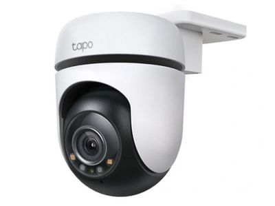 a close up of a camera mounted on the side of a wall