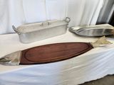 two trays and a tray with a fish on a table