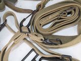 a close up of a pair of belts on a table