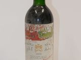 a bottle of wine that is sitting on a table