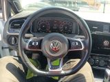 dashboard of a car with a steering wheel and dashboard lights