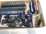 a box full of different types of toy trains in it