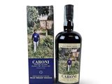 a bottle of caroni extra virgin olive oil next to a box