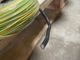 a stack of wires on a pallet in a warehouse