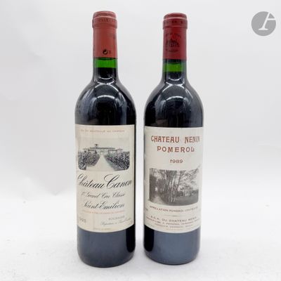 deux bouteilles de vin assises l'une à côté de l'autre