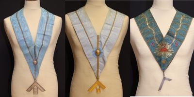 three mannequins with different colors and designs are displayed on a mannequin