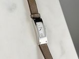 a close up of a wrist watch on a table