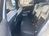 the back seats of a car are black and white in color