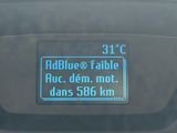 a close up of a car dashboard with a speedometer