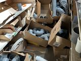 many boxes of items that are sitting on the floor