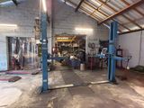 an image of a garage with a lot of tools
