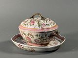 a bowl and saucer on a saucer on a plate