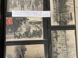 an old photo of a group of people in a picture album