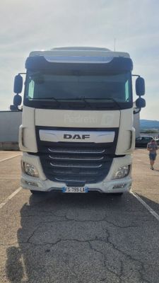 a white truck that is parked in a parking lot