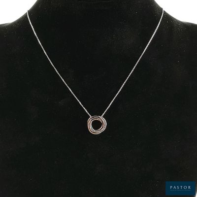 a necklace on a mannequin neck with a black background