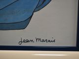 a picture of a painting of a blue tie on a white wall
