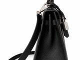 a black purse on a white background with a strap