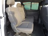 a white van with four seats in the back of it