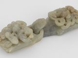 deux morceaux de savon sculptés posés sur une surface blanche