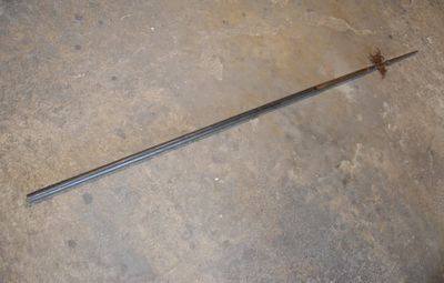 a sword that is laying on the floor in the room