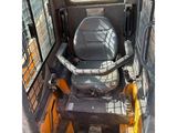 a seat on the back of a construction vehicle