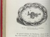 an open book with a drawing of a clock on it