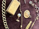 a lot of jewelry that is laying out on the table