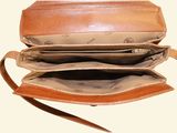 a purse that is open on a white surface